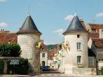 Two Romanesque towers in famous wine village Chablis, France.