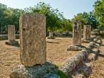 Row of ancient columns at Olympia;  