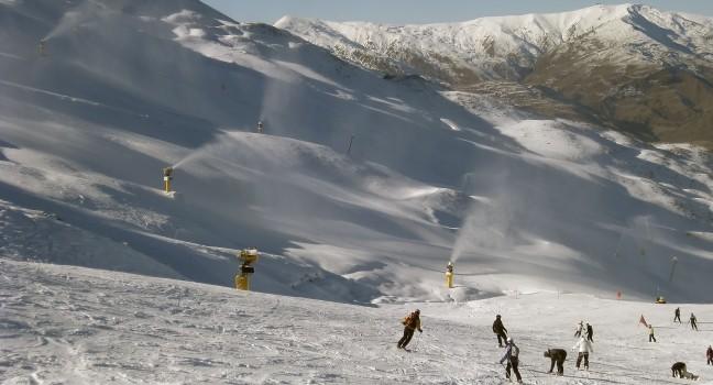 Skiers on New Zealand's Coronet Peak in Queenstown 