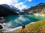Hiker on the Blanca Lake, Washington. State. Located in the Henry M. Jackson Wilderness Area, Beautiful turquoise green lake. Only accessible by foot. Elevation Gain: 2700 ft in. 5 hours, 8 miles.; Shutterstock ID 75001846; Project/Title: Weekend Getaways;
