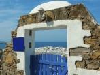 Top view of Mykonos town through the blue gates 