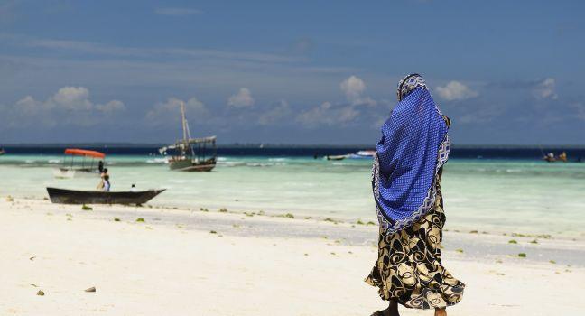 Tanzania, Ethnic women on the beautiful beach on the  Zanzibar island